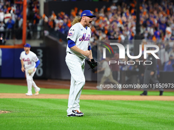 New York Mets relief pitcher Ryne Stanek #55 celebrates the final out of Game 3 of a baseball NL Division Series against the Philadelphia Ph...