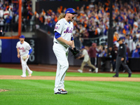 New York Mets relief pitcher Ryne Stanek #55 celebrates the final out of Game 3 of a baseball NL Division Series against the Philadelphia Ph...