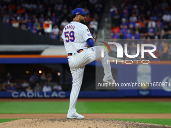 New York Mets starting pitcher Sean Manaea #59 throws during the fifth inning in Game 3 of a baseball NL Division Series against the Philade...