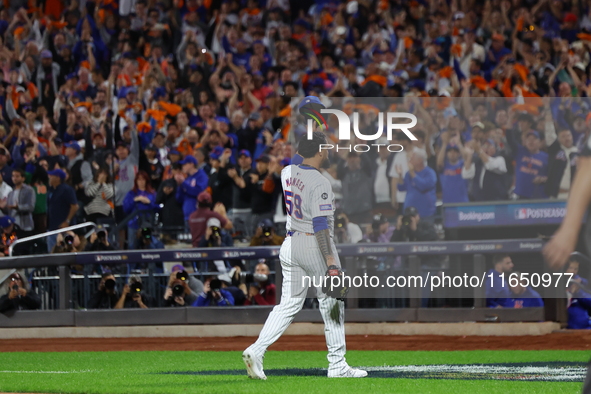 New York Mets starting pitcher Sean Manaea #59 leaves the game during the eighth inning in Game 3 of a baseball NL Division Series against t...