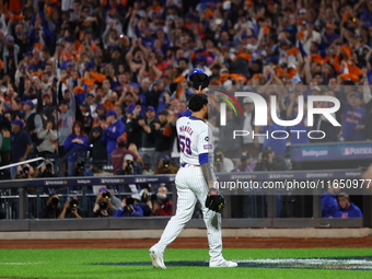 New York Mets starting pitcher Sean Manaea #59 leaves the game during the eighth inning in Game 3 of a baseball NL Division Series against t...