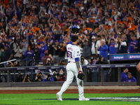 New York Mets starting pitcher Sean Manaea #59 leaves the game during the eighth inning in Game 3 of a baseball NL Division Series against t...