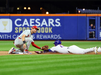 Harrison Bader #44 of the New York Mets steals second base during the seventh inning in Game 3 of a baseball NL Division Series against the...