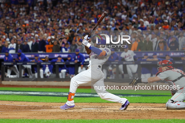 New York Mets' Starling Marte #6 singles during the sixth inning in Game 3 of a baseball NL Division Series against the Philadelphia Phillie...