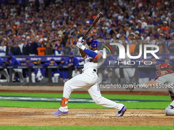 New York Mets' Starling Marte #6 singles during the sixth inning in Game 3 of a baseball NL Division Series against the Philadelphia Phillie...