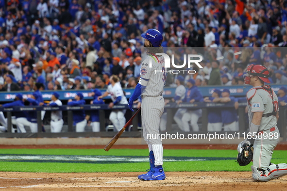 Jesse Winker #3 of the New York Mets hits a solo home run during the fourth inning in Game 3 of a baseball NL Division Series against the Ph...