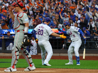 Pete Alonso #20 of the New York Mets rounds the bases after homering during the second inning in Game 3 of a baseball NL Division Series aga...