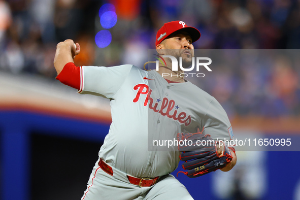 Philadelphia Phillies relief pitcher Carlos Estavez #53 throws during the eighth inning in Game 3 of a baseball NL Division Series against t...