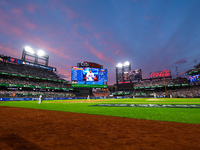 The evening sky appears during Game 3 of a baseball NL Division Series between the Philadelphia Phillies and the New York Mets at Citi Field...