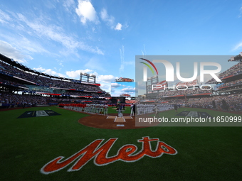 Players and staff of the Philadelphia Phillies and the New York Mets are introduced before Game 3 of a baseball NL Division Series at Citi F...