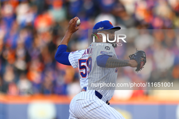 New York Mets starting pitcher Sean Manaea #59 throws during the first inning in Game 3 of a baseball NL Division Series against the Philade...