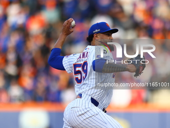 New York Mets starting pitcher Sean Manaea #59 throws during the first inning in Game 3 of a baseball NL Division Series against the Philade...