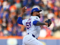 New York Mets starting pitcher Sean Manaea #59 throws during the first inning in Game 3 of a baseball NL Division Series against the Philade...