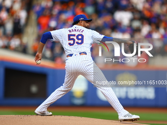 New York Mets starting pitcher Sean Manaea #59 throws during the first inning in Game 3 of a baseball NL Division Series against the Philade...