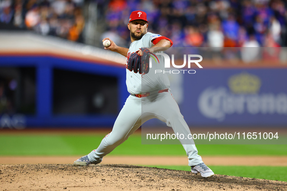 Philadelphia Phillies relief pitcher Carlos Estavez #53 throws during the eighth inning in Game 3 of a baseball NL Division Series against t...