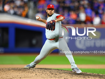 Philadelphia Phillies relief pitcher Carlos Estavez #53 throws during the eighth inning in Game 3 of a baseball NL Division Series against t...