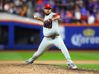 Philadelphia Phillies relief pitcher Carlos Estavez #53 throws during the eighth inning in Game 3 of a baseball NL Division Series against t...