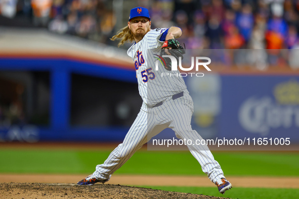 New York Mets relief pitcher Ryne Stanek #55 throws during the ninth inning in Game 3 of a baseball NL Division Series against the Philadelp...