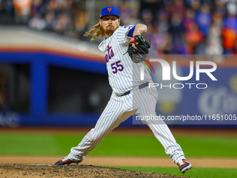 New York Mets relief pitcher Ryne Stanek #55 throws during the ninth inning in Game 3 of a baseball NL Division Series against the Philadelp...