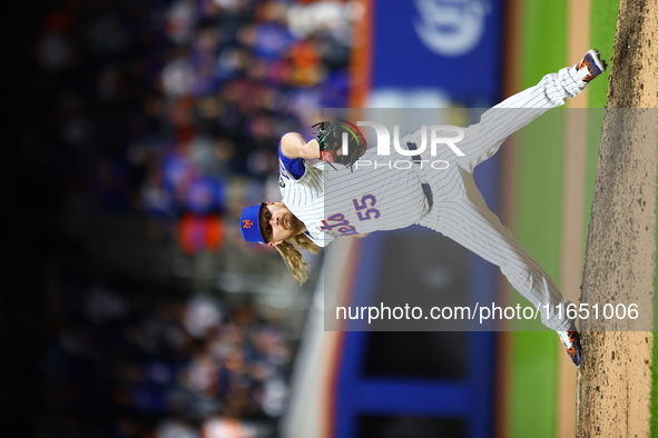 New York Mets relief pitcher Ryne Stanek #55 throws during the ninth inning in Game 3 of a baseball NL Division Series against the Philadelp...