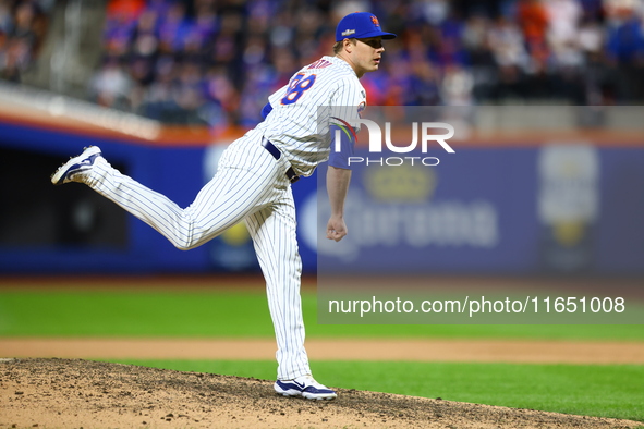 New York Mets relief pitcher Phil Maton #88 throws during the eighth inning in Game 3 of a baseball NL Division Series against the Philadelp...