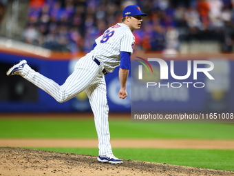 New York Mets relief pitcher Phil Maton #88 throws during the eighth inning in Game 3 of a baseball NL Division Series against the Philadelp...