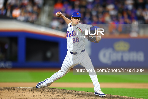 New York Mets relief pitcher Phil Maton #88 throws during the eighth inning in Game 3 of a baseball NL Division Series against the Philadelp...