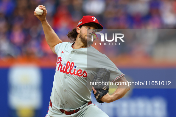 Philadelphia Phillies starting pitcher Aaron Nola #27 throws during the third inning in Game 3 of a baseball NL Division Series against the...