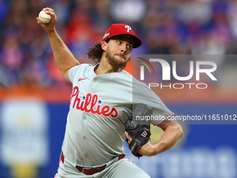 Philadelphia Phillies starting pitcher Aaron Nola #27 throws during the third inning in Game 3 of a baseball NL Division Series against the...