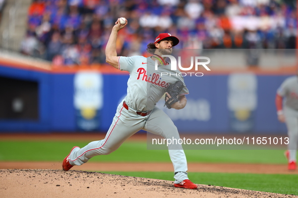 Philadelphia Phillies starting pitcher Aaron Nola #27 throws during the first inning in Game 3 of a baseball NL Division Series against the...