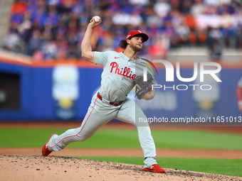 Philadelphia Phillies starting pitcher Aaron Nola #27 throws during the first inning in Game 3 of a baseball NL Division Series against the...