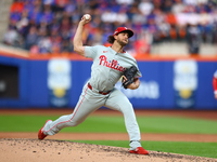 Philadelphia Phillies starting pitcher Aaron Nola #27 throws during the first inning in Game 3 of a baseball NL Division Series against the...