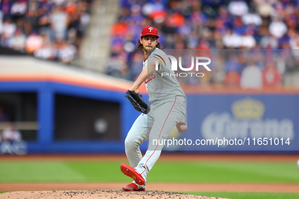 Philadelphia Phillies starting pitcher Aaron Nola #27 throws during the first inning in Game 3 of a baseball NL Division Series against the...