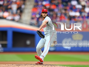 Philadelphia Phillies starting pitcher Aaron Nola #27 throws during the first inning in Game 3 of a baseball NL Division Series against the...