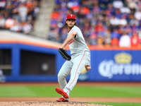 Philadelphia Phillies starting pitcher Aaron Nola #27 throws during the first inning in Game 3 of a baseball NL Division Series against the...