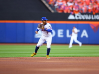 New York Mets shortstop Francisco Lindor #12 fields and throws during the first inning in Game 3 of a baseball NL Division Series against th...