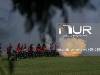 The Nepal Army fires cannons during the grand rehearsal of the Phulpati celebration at the army pavilion in Kathmandu, Nepal, on October 8,...