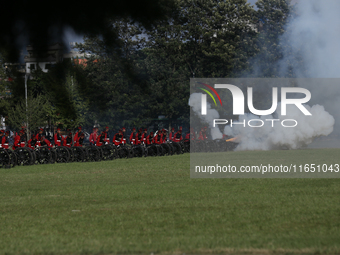 The Nepal Army fires cannons during the grand rehearsal of the Phulpati celebration at the army pavilion in Kathmandu, Nepal, on October 8,...