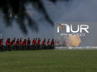 The Nepal Army fires cannons during the grand rehearsal of the Phulpati celebration at the army pavilion in Kathmandu, Nepal, on October 8,...