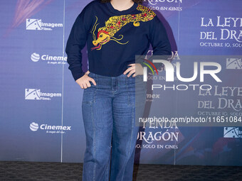 Lucero Mijares poses for photos during a press conference to promote the animated film 'La Leyenda del Dragon' at Cinemex Artz Pedregal in M...