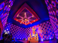 A Hindu Goddess Durga idol is inside the decoration of a puja pandal, a temporary structure set up during the Durga Puja festival in Kolkata...