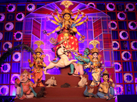 A Hindu Goddess Durga idol is inside the decoration of a puja pandal, a temporary structure set up during the Durga Puja festival in Kolkata...