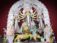 A Hindu Goddess Durga idol is inside the decoration of a puja pandal, a temporary structure set up during the Durga Puja festival in Kolkata...