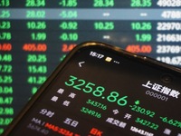 This is the day's stock index closing point displayed on the mobile phone of a citizen in Hangzhou, China, on October 9, 2024. (