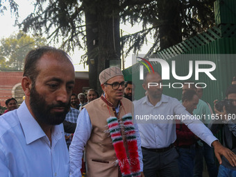 Jammu and Kashmir National Conference (JKNC) party leader Omar Abdullah (C) is greeted by supporters at his residence, a day after his victo...