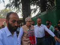 Jammu and Kashmir National Conference (JKNC) party leader Omar Abdullah (C) is greeted by supporters at his residence, a day after his victo...