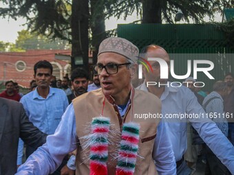 Jammu and Kashmir National Conference (JKNC) party leader Omar Abdullah (C) is greeted by supporters at his residence, a day after his victo...