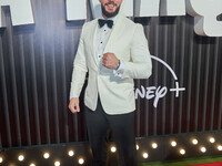 Chris Evangelou attends the red carpet of the 'La Maquina' film premiere by Disney Plus at Teatro Telcel in Mexico City, Mexico, on October...