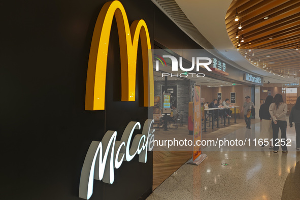 Customers eat at a McDonald's fast food restaurant in a shopping mall in the Huangpu district of Shanghai, China, on October 9, 2024. 