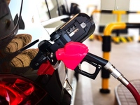 A vehicle fills up at a gas station in the Haidian district in Beijing, China, on October 9, 2024. (